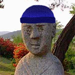 Rob's usual avatar, wearing a blue beanie, or watchcap if you prefer.